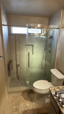 Walk-In Shower Conversion - This client had a regular tub and shower and wanted to convert to an ADA Shower. We demoed the whole shower set up and made an accessible shower for her mother.