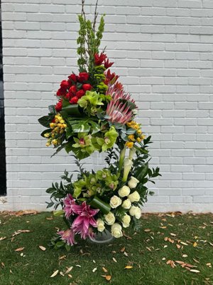 CUSTOM DESIGNS - WE DESIGNS ARTS OF WORK LIKE THESE ALL THE TIME. GIVE US A CALL OR VISIT OUR WEBSITE TO BECOME THE NEXT HAPPY FLORAL CONCEPTS CUSTOMER!