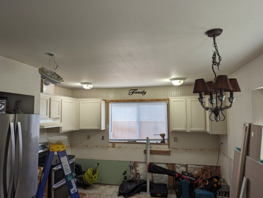 Lighting Update - In this kitchen we updated the surface mount lights to LED wafer lights. Lighting Update - In this kitchen we updated the surface mount lights to LED wafer lights.