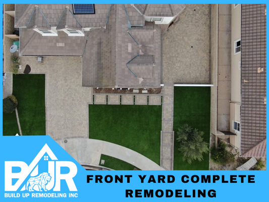 Moorpark - Front Yard & Driveway Remodel - We gave this Moorpark home a stunning front yard transformation with stylish pavers, lush artificial turf, and a sleek block wall for added privacy and structure. Integrated LED lighting highlights the design and adds a warm, inviting glow at night—perfect for both curb appeal and functionality.