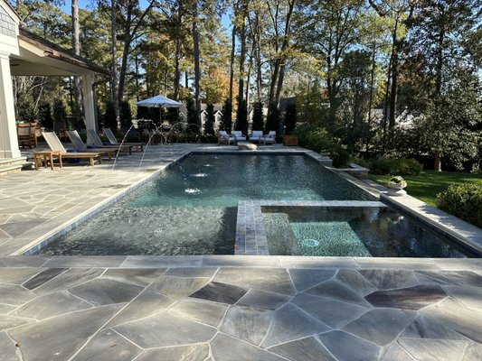 Pruitt Pool 2023 - This beautiful project was completed in July of 2023. It includes a 18’x38’ pool with an 9’x9’ hot tub, vanishing edge and 4 deck jets.