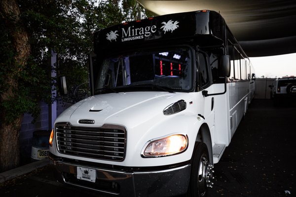 40 PASSENGER PARTY BUS / LIMO BUS - Introducing our 40 Passenger Party Bus/Limo Bus—an extravagant haven on wheels that transforms any event into a rolling celebration. With a seating capacity for 40 passengers, this spacious and luxurious party bus is the epitome of opulence and entertainment.

Step aboard and immerse yourself in a world of plush leather seating, vibrant lighting, and state-of-the-art entertainment systems. The spacious interior is designed to accommodate large groups, making it ideal for weddings, corporate events, birthdays, and any occasion where a touch of luxury is essential.

Our 40 Passenger Party Bus/Limo Bus is not just a mode of transportation; it's a mobile party venue. Equipped with amenities like a premium sound system, LED lighting, and a full-service bar, your journey becomes an unforgettable experience. Dance, mingle, and enjoy the ride as our professional chauffeur navigates the streets with precision.

Perfect for large gatherings and special events, this party bus offers the ultimate combination of comfort and entertainment. Whether you're planning a night out on the town, a corporate retreat, or a wedding celebration, our 40 Passenger Party Bus/Limo Bus ensures that the journey itself becomes a highlight of the occasion.

Book now and elevate your group's experience to new heights. Indulge in the luxury of our 40 Passenger Party Bus/Limo Bus, where every ride is a celebration of style, sophistication, and sheer excitement.