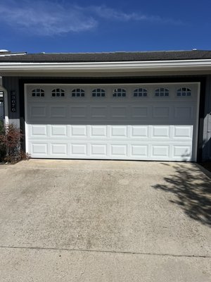 Quick and Easy Door Replacement - This customer had his garage door for over 30 years so he knew it was time to replace it. We got him a standard door with insulation and windows to keep it nice and cool in the garage.