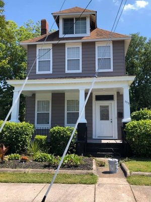 Residential exterior painting color change - Repainting of the exterior on a two story residential property.