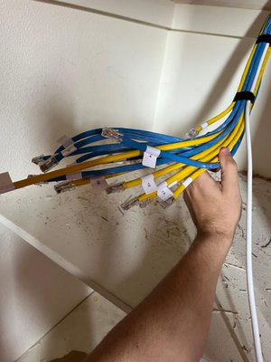 Network Installation - This project involved the installation and configuration of a wireless network infrastructure for a customer's remodel project. The scope included setting up a wireless structured media enclosure, terminating 14 wires, and installing two Cisco access points and a switch. This project is still on going. Network Installation - This project involved the installation and configuration of a wireless network infrastructure for a customer's remodel project. The scope included setting up a wireless structured media enclosure, terminating 14 wires, and installing two Cisco access points and a switch. This project is still on going.