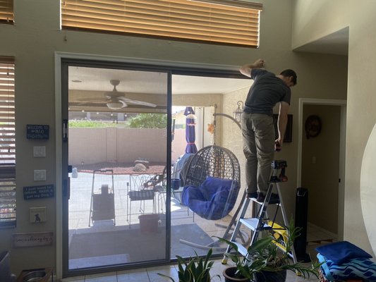 Two-in-one honeycomb shade over a slider. One of so many options for door and sliders! - This project was completed for a customer that wanted light and heat control from their slider while allowing the versatility to keep half of the door open at times. Motorization allows them to control their shade from the comfort of their living room chair… or anywhere! Two-in-one honeycomb shade over a slider. One of so many options for door and sliders! - This project was completed for a customer that wanted light and heat control from their slider while allowing the versatility to keep half of the door open at times. Motorization allows them to control their shade from the comfort of their living room chair… or anywhere!