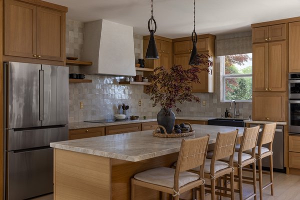 Alameda Renovation - This renovation and furnishings project focused on natural materials like oak, stone, and alabaster in modern streamlined forms.