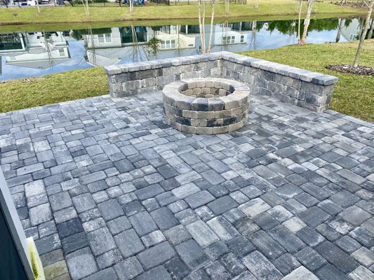 Glacier Patio w/ Firepit - Andrew had seen some of the work we had done for other customers and called us in to build a paver patio to match his house. They wanted a firepit with some seating and enough space for the baby to crawl around. And to add the smoker of course. We did this job in one day and now they can smoke some ribs while sitting around the fire! Glacier Patio w/ Firepit - Andrew had seen some of the work we had done for other customers and called us in to build a paver patio to match his house. They wanted a firepit with some seating and enough space for the baby to crawl around. And to add the smoker of course. We did this job in one day and now they can smoke some ribs while sitting around the fire!