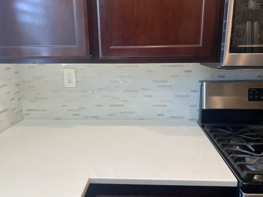 Backsplash in Anaheim - This was a backsplash remodel for our client in Anaheim. They chose to go with the 12 x 12 white frosted glass mosaic sheet that was capped off with metal trim around all exposed edges with Arctic white grout. This was a really fun installation. Backsplash in Anaheim - This was a backsplash remodel for our client in Anaheim. They chose to go with the 12 x 12 white frosted glass mosaic sheet that was capped off with metal trim around all exposed edges with Arctic white grout. This was a really fun installation.