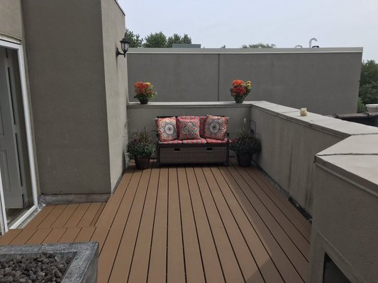 Rooftop Decks with Views for Days! - Rooftop Decks by Chicago Porch Authority
Established in 1990, Chicago Porch Authority is a licensed and insured contractor specializing in the design and construction of custom rooftop decks. We have built a reputation for quality and craftsmanship in every project, ensuring that your rooftop space is a true extension of your home. Our team uses premium materials such as #1 treated lumber, durable Trex composite decking, and sleek metal railings to create functional, long-lasting, and stylish outdoor spaces. Whether you're looking for a peaceful retreat or an entertainment hub, we bring your vision to life with expert design and superior construction. Let us help you elevate your outdoor living experience!