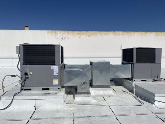 New installation. commercial package units. - New installation of two Gas-electric package units on a commercial building.
Heating and cooling units. New ductwork.