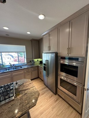 Reface in Danville - Reface existing cabinets for a lighter finish and new door style and replacing tile floors with SPC.