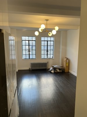 Floor resurfacing and staining - Resurfacing hardwood floor and applying a dark walnut brown gave this apartment an elegant touch. Client was very pleased! Floor resurfacing and staining - Resurfacing hardwood floor and applying a dark walnut brown gave this apartment an elegant touch. Client was very pleased!