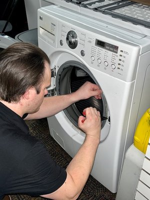 Dryer Repair in Eden Prairie - In Eden Prairie, MN, we expertly replaced a dryer's drum seal to address inefficiency and safety concerns. The power was disconnected for safety, and the technician dismantled the dryer's top and front panels to remove the old, frayed seal. With a new seal and high-temperature adhesive in hand, he meticulously cleaned the drum's edge, applied the glue, and affixed the new seal. After reassembling the machine and allowing the adhesive to set, a test run confirmed a smooth, noise-free cycle. This precise repair restored the dryer to optimal function, ensuring safety and efficiency for the household's laundry routine. Dryer Repair in Eden Prairie - In Eden Prairie, MN, we expertly replaced a dryer's drum seal to address inefficiency and safety concerns. The power was disconnected for safety, and the technician dismantled the dryer's top and front panels to remove the old, frayed seal. With a new seal and high-temperature adhesive in hand, he meticulously cleaned the drum's edge, applied the glue, and affixed the new seal. After reassembling the machine and allowing the adhesive to set, a test run confirmed a smooth, noise-free cycle. This precise repair restored the dryer to optimal function, ensuring safety and efficiency for the household's laundry routine.