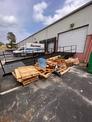Commercial Pallet Pickup - One of our commercial clients had regular pallet buildup that they had to handle in-house. We were able to step in and regularly clean up their loading dock, making their logistics easier, increasing the efficiency and safety of their operation, and keeping their team doing what they were trained for. Commercial Pallet Pickup - One of our commercial clients had regular pallet buildup that they had to handle in-house. We were able to step in and regularly clean up their loading dock, making their logistics easier, increasing the efficiency and safety of their operation, and keeping their team doing what they were trained for.