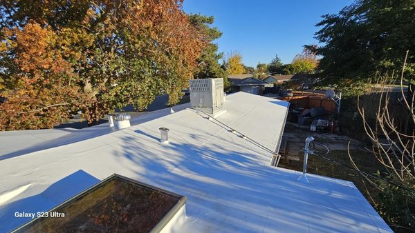 Citrus Heights Re-Roof - We removed an old asphalt and gravel roof and installed a brand new TPO roof. Citrus Heights Re-Roof - We removed an old asphalt and gravel roof and installed a brand new TPO roof.