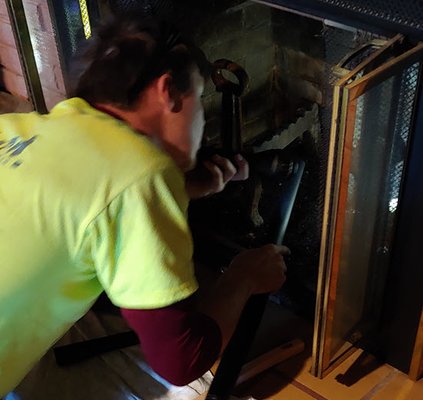 Chimney sweep after years of neglect - After years of neglect, this fireplace is now ready to go.  It is safe from creosote and the firebrick is good.  Don't risk a chimney fire when we can help you sleep peacefully.