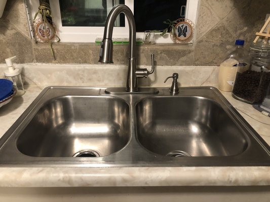 New Faucet and Sink Install - We installed a new faucet in this sink, we also cleaned, recaulked and re-set the existing sink. New Faucet and Sink Install - We installed a new faucet in this sink, we also cleaned, recaulked and re-set the existing sink.