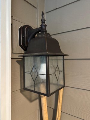 Outdoor Lighting - This outdoor light was beat up by weather and the elements.  We got a hold of it and made it look just like new!