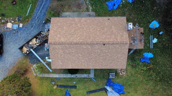 Roof Replacement - We had to remove 2 layers of 3 tab shingles on this home in Rindge. It was a fun project for a great family! Our crew constantly went the extra mile down to the clean up. So proud of the RoofSmith New England team. Roof Replacement - We had to remove 2 layers of 3 tab shingles on this home in Rindge. It was a fun project for a great family! Our crew constantly went the extra mile down to the clean up. So proud of the RoofSmith New England team.