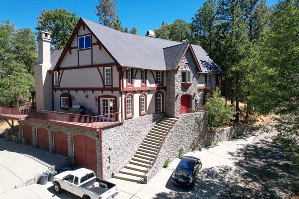 Lake Arrowhead Roof Upgrade with Owens Corning Cool Roof Technology - We completed a stunning full roof replacement for a residential property in beautiful Lake Arrowhead, California. This project features the advanced Owens Corning Cool Roof Shingles, designed to reflect solar energy and help reduce roof surface temperatures—an ideal solution for mountain climates where energy efficiency and year-round durability are critical.
Our team at Good People Roofing, Inc. removed the aged, weather-worn roofing system and installed a brand-new, energy-efficient, and environmentally conscious roofing solution. The Cool Roof technology not only enhances the home's aesthetic with a sleek finish but also helps lower energy bills by reducing the need for air conditioning during warmer months.
This Lake Arrowhead project highlights our commitment to using high-performance roofing materials, expert craftsmanship, and solutions that maximize energy efficiency, improve curb appeal, and withstand diverse weather conditions. Whether you're in the mountains or the city, we're proud to offer roofing systems that combine style, strength, and sustainability.
Location: Lake Arrowhead, CA
Service Provided: Full Roof Replacement
Roofing Material: Owens Corning Cool Roof Shingles
Key Benefits: Energy Efficiency, Solar Reflectivity, Long-Term Durability, Elevated Home Value Lake Arrowhead Roof Upgrade with Owens Corning Cool Roof Technology - We completed a stunning full roof replacement for a residential property in beautiful Lake Arrowhead, California. This project features the advanced Owens Corning Cool Roof Shingles, designed to reflect solar energy and help reduce roof surface temperatures—an ideal solution for mountain climates where energy efficiency and year-round durability are critical.
Our team at Good People Roofing, Inc. removed the aged, weather-worn roofing system and installed a brand-new, energy-efficient, and environmentally conscious roofing solution. The Cool Roof technology not only enhances the home's aesthetic with a sleek finish but also helps lower energy bills by reducing the need for air conditioning during warmer months.
This Lake Arrowhead project highlights our commitment to using high-performance roofing materials, expert craftsmanship, and solutions that maximize energy efficiency, improve curb appeal, and withstand diverse weather conditions. Whether you're in the mountains or the city, we're proud to offer roofing systems that combine style, strength, and sustainability.
Location: Lake Arrowhead, CA
Service Provided: Full Roof Replacement
Roofing Material: Owens Corning Cool Roof Shingles
Key Benefits: Energy Efficiency, Solar Reflectivity, Long-Term Durability, Elevated Home Value
