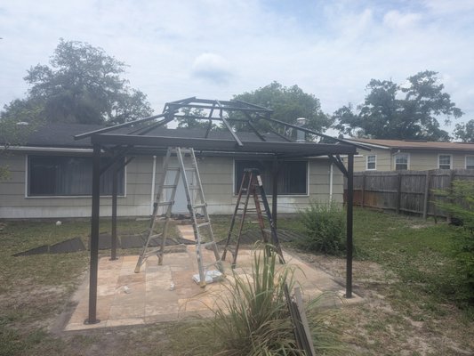 Gazebo - build a 8 x 12 Gazebo in backyard, platform is pavers, gazebo is metal