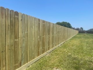 Wooden Fence Replacement - This customers fence was blown down by a storm that blew through.  Here are some before and after pictures.