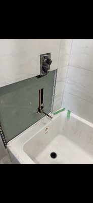 Missing bathtub filler spout in a brand new bathroom. - The plumber forgot to install the stub out for the tub filler and the tiler didn’t care enough to mention it even though he knew something is missing. None of them are anywhere to be found so I got the call and did both their jobs and now the customer has a tub filler. Missing bathtub filler spout in a brand new bathroom. - The plumber forgot to install the stub out for the tub filler and the tiler didn’t care enough to mention it even though he knew something is missing. None of them are anywhere to be found so I got the call and did both their jobs and now the customer has a tub filler.