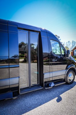 Airport Transfers - Enjoy stress-free travel with our punctual and reliable airport transfer services. We cater to both corporate and leisure travelers, ensuring a smooth ride to and from the airport in our luxurious Mercedes Sprinter.
Details:
Punctuality: Our chauffeurs monitor flight schedules to ensure timely pickups and drop-offs.
Comfort: Spacious seating for up to 10 passengers, ample luggage space, and complimentary refreshments.
Convenience: Door-to-door service, assistance with luggage, and meet-and-greet services at the airport.
Amenities: Complimentary WiFi and cable to stay connected and entertained during your ride.
Safety: Experienced and professional chauffeurs ensuring a secure and smooth ride. Airport Transfers - Enjoy stress-free travel with our punctual and reliable airport transfer services. We cater to both corporate and leisure travelers, ensuring a smooth ride to and from the airport in our luxurious Mercedes Sprinter.
Details:
Punctuality: Our chauffeurs monitor flight schedules to ensure timely pickups and drop-offs.
Comfort: Spacious seating for up to 10 passengers, ample luggage space, and complimentary refreshments.
Convenience: Door-to-door service, assistance with luggage, and meet-and-greet services at the airport.
Amenities: Complimentary WiFi and cable to stay connected and entertained during your ride.
Safety: Experienced and professional chauffeurs ensuring a secure and smooth ride.