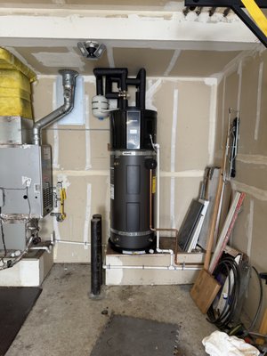 Navien Heat Pump Water Heater Installation in Mountain View - In this Mountain View home, we replaced an outdated conventional water heater with a modern, energy-efficient Navien heat pump water heater. The new system provides reliable hot water while dramatically reducing energy consumption and utility costs.
The installation required careful planning and expert execution. We ensured proper electrical connections, drainage setup, and optimal placement for maximum efficiency. The new Navien unit was professionally installed with all required safety features and proper ventilation.
Key benefits of the new system:
- Lower energy costs due to heat pump technology - Uses up to 70% less energy than conventional water heaters
- Environmentally friendly, with minimal carbon footprint - Reduces greenhouse gas emissions significantly
- Advanced smart features and monitoring - WiFi connectivity allows remote monitoring and control
- Consistent hot water supply for the entire household - High recovery rate ensures no one runs out of hot water
- Increased property value with an updated, premium water heating system - Navien is recognized as a top-tier brand
- Quiet operation with minimal noise - Advanced compressor technology keeps noise levels low
This upgrade gives the homeowner a reliable, efficient, and modern solution for hot water needs year-round, with significant long-term savings on energy bills.
Project Duration: 1 day Navien Heat Pump Water Heater Installation in Mountain View - In this Mountain View home, we replaced an outdated conventional water heater with a modern, energy-efficient Navien heat pump water heater. The new system provides reliable hot water while dramatically reducing energy consumption and utility costs.
The installation required careful planning and expert execution. We ensured proper electrical connections, drainage setup, and optimal placement for maximum efficiency. The new Navien unit was professionally installed with all required safety features and proper ventilation.
Key benefits of the new system:
- Lower energy costs due to heat pump technology - Uses up to 70% less energy than conventional water heaters
- Environmentally friendly, with minimal carbon footprint - Reduces greenhouse gas emissions significantly
- Advanced smart features and monitoring - WiFi connectivity allows remote monitoring and control
- Consistent hot water supply for the entire household - High recovery rate ensures no one runs out of hot water
- Increased property value with an updated, premium water heating system - Navien is recognized as a top-tier brand
- Quiet operation with minimal noise - Advanced compressor technology keeps noise levels low
This upgrade gives the homeowner a reliable, efficient, and modern solution for hot water needs year-round, with significant long-term savings on energy bills.
Project Duration: 1 day