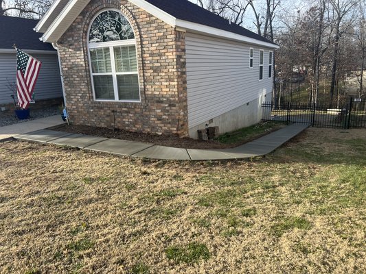 New Sidewalk - This client hired us to build this new sidewalk, connecting it from the house to the backyard New Sidewalk - This client hired us to build this new sidewalk, connecting it from the house to the backyard