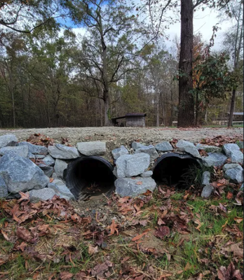 Culverts - Drain My Lawn installs culverts to move stormwater under driveways, yards & roads, preventing flooding & erosion. Serving Charlotte, Monroe, Waxhaw, Fort Mill, Concord, Matthews & nearby areas. Culverts - Drain My Lawn installs culverts to move stormwater under driveways, yards & roads, preventing flooding & erosion. Serving Charlotte, Monroe, Waxhaw, Fort Mill, Concord, Matthews & nearby areas.