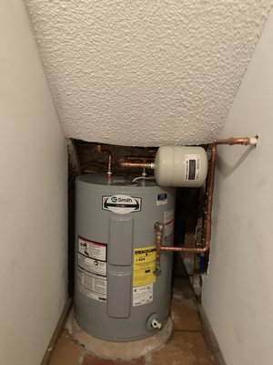 Electric water heater - Old water heater replacement. 38 gallon electric. Thermal expansion tank Electric water heater - Old water heater replacement. 38 gallon electric. Thermal expansion tank