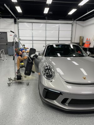 Dent Repair on Porsche GT3 - A customer brought in their Porsche with a dent on the passenger side door. Using our skilled Paintless Dent Repair (PDR) method, we were able to remove the dent without needing any paintwork. We successfully returned the vehicle to the customer the same day, with the door looking as good as new Dent Repair on Porsche GT3 - A customer brought in their Porsche with a dent on the passenger side door. Using our skilled Paintless Dent Repair (PDR) method, we were able to remove the dent without needing any paintwork. We successfully returned the vehicle to the customer the same day, with the door looking as good as new