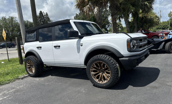 Lift Kits / Offroad - Lift kits significantly improve off-road vehicles by providing increased ground clearance and better approach/departure angles, allowing you to navigate rugged terrain without damaging the undercarriage. These kits enhance performance by allowing for larger tires and improving the suspension's ability to handle uneven surfaces.