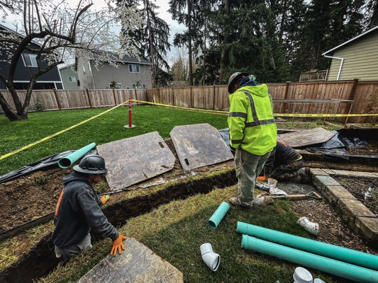 Septic to Sewer in Bothell - This project is a Septic to Sewer conversion due to a failing septic system. The project included a connection to a city-owned stub at the property line: trench work, new pipe inspection, backfill, septic tank abandonment, and final clean-up.