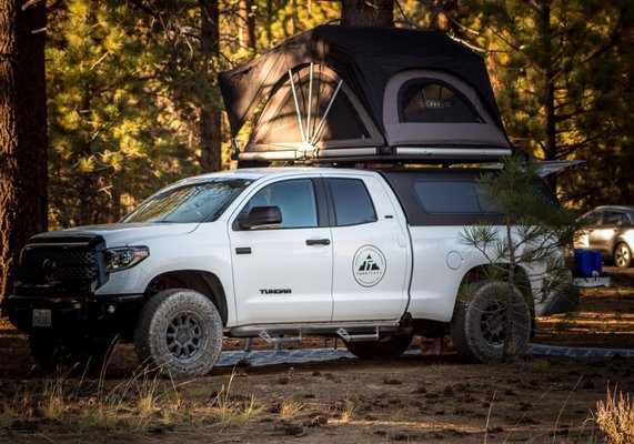2020 Tundra with FSR RTT - Toyota Tacoma TRD Off-Road | 5 seat belts | Sleeps 2 adults & 1 kid
NIGHTLY RATES
Winter $99 ● Spring & Holiday $119 ● Peak $139
AVAILABLE FOR RENT is our 2017 Toyota Tacoma TRD Off-Road & Freespirit Recreation RTT. Whether you’re looking for an affordable camping rental for the family or you’re an Overland extremist, this set up is great for you! It’s the perfect set up for a weekend trip to the mountains, desert, beach or an off-road adventure. Truly go where most can’t! This vehicle has lots of extras listed below, as well as lots of additional rental options to make your camping experience a great one!
2017 Toyota Tacoma TRD Off-Road
Advanced off-road technologies and heavy-duty components take this truck to places others fear to tread. A powerful and efficient V6 has got the goods to get you to the end of the map and back. Inside, superior comfort and tech keep you feeling refreshed during those hard-charging expeditions. It’s time to get in touch with your gnarly side. Let’s go places. This truck has lots of upgrades from stock listed below.
• Toyo Open Country ATT-2 285x75x17 Off-Road Tires with full size spare
• Black Method Wheels (The Standard) 17x8.5 with 6 on 5.5 Bolt Pattern
• Bilstein 6112 Shocks (3 Inch lift) in the front & Bilstein 5100 with Icon 1.5in add-a-leaf in the back
• All-Pro Bed Rack + 5 Foot bed for storage with 9V or 110 Power Inverter/Outlet
• Pelfrey Bit off-road custom aluminum front bumper with 30in LED light bar
• Genesis Off-Road dual battery kit with 2 group 34 AGM batteries
• Prinsu roof rack (cab)
• Maxxtrax style recovery boards
• Hi-Lift Jack
• Basic tool kit, first aid & emergency kits, vehicle leveling blocks, small air compressor, tire deflating tools, binoculars, small inverter, lithium ion battery jump starter, small flashlight, etc.
• 7-Gallon Road shower (pressurized) with a shower attachment and hose with spray nozzle
FSR High Country 55' Tri-Layer RTT
• Sleeps 2-3 People
• Exterior Dimensions: 60Lx52Wx14H
• Interior Dimensions: 55Lx98W
• Weight: 141 lbs
• Mattress: 2 Inch Foam
• Weight Capacity: 750 lbs
• Frame: Extruded Aluminum Alloy 2020 Tundra with FSR RTT - Toyota Tacoma TRD Off-Road | 5 seat belts | Sleeps 2 adults & 1 kid
NIGHTLY RATES
Winter $99 ● Spring & Holiday $119 ● Peak $139
AVAILABLE FOR RENT is our 2017 Toyota Tacoma TRD Off-Road & Freespirit Recreation RTT. Whether you’re looking for an affordable camping rental for the family or you’re an Overland extremist, this set up is great for you! It’s the perfect set up for a weekend trip to the mountains, desert, beach or an off-road adventure. Truly go where most can’t! This vehicle has lots of extras listed below, as well as lots of additional rental options to make your camping experience a great one!
2017 Toyota Tacoma TRD Off-Road
Advanced off-road technologies and heavy-duty components take this truck to places others fear to tread. A powerful and efficient V6 has got the goods to get you to the end of the map and back. Inside, superior comfort and tech keep you feeling refreshed during those hard-charging expeditions. It’s time to get in touch with your gnarly side. Let’s go places. This truck has lots of upgrades from stock listed below.
• Toyo Open Country ATT-2 285x75x17 Off-Road Tires with full size spare
• Black Method Wheels (The Standard) 17x8.5 with 6 on 5.5 Bolt Pattern
• Bilstein 6112 Shocks (3 Inch lift) in the front & Bilstein 5100 with Icon 1.5in add-a-leaf in the back
• All-Pro Bed Rack + 5 Foot bed for storage with 9V or 110 Power Inverter/Outlet
• Pelfrey Bit off-road custom aluminum front bumper with 30in LED light bar
• Genesis Off-Road dual battery kit with 2 group 34 AGM batteries
• Prinsu roof rack (cab)
• Maxxtrax style recovery boards
• Hi-Lift Jack
• Basic tool kit, first aid & emergency kits, vehicle leveling blocks, small air compressor, tire deflating tools, binoculars, small inverter, lithium ion battery jump starter, small flashlight, etc.
• 7-Gallon Road shower (pressurized) with a shower attachment and hose with spray nozzle
FSR High Country 55' Tri-Layer RTT
• Sleeps 2-3 People
• Exterior Dimensions: 60Lx52Wx14H
• Interior Dimensions: 55Lx98W
• Weight: 141 lbs
• Mattress: 2 Inch Foam
• Weight Capacity: 750 lbs
• Frame: Extruded Aluminum Alloy