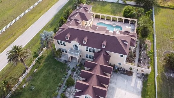 New Shingle roof - Property suffered much damaged from hurricane and necessitated a re-roof