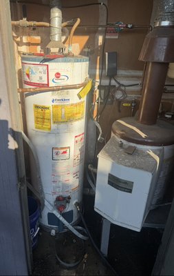Tankless Water Heater and Softener Install - This mechanical room got a full upgrade! Form old 40 gallon natural gas Rheem tank to a State of the art Navien 240 A2 tankless system. We included the install of a customer supplied water softener as well as removing their old hydronic heating system to help make room!