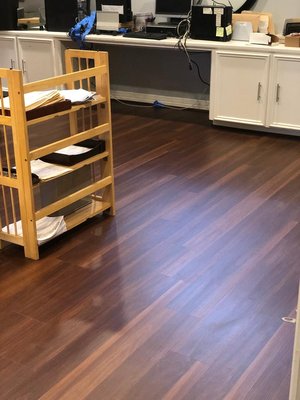Vinyl Flooring - Vinyl is a less expensive but still high quality material. Great option when working with a budget! Call us today for a free estimate.