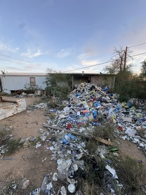 Hoarder Cleanout - Full property cleanup completed by Shane’s Stellar Junk Removal in Tucson, AZ. This project involved removing a massive pile of accumulated trash, debris, and household waste that had built up outside the property.

Our team hauled away large volumes of garbage including plastic, cans, construction debris, and general junk. After loading everything into our dump trailer, we cleared the entire area and restored the yard to a clean, usable condition.

Projects like this are common for property cleanouts, hoarder situations, rental turnovers, and estate cleanouts where a large amount of junk needs to be removed quickly and efficiently.

Services performed:
• Property cleanout
• Trash and debris removal
• Bulk junk hauling
• Yard cleanup

If you need help with large cleanups, hoarder properties, or major junk removal projects in Tucson, Shane’s Stellar Junk Removal is ready to help.
