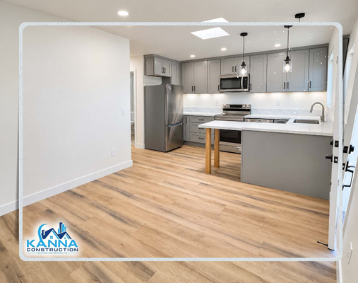 Clairemont | Gorgeous Garage Conversion - Transformed an underutilized garage space into a fully functional, stylish Accessory Dwelling Unit (ADU) complete with a full custom kitchen and open-concept living area. Crafted by Kanna Construction, this conversion maximizes square footage with modern aesthetics and top-tier craftsmanship.
Custom Kitchen Suite: Sleek grey shaker cabinetry with modern matte black hardware, under-cabinet LED task lighting, and white marble-look quartz countertops with a matching full-height backsplash.
Full-Sized Appliances: Outfitted with stainless steel, full-sized appliances, including a over-the-range microwave, electric range, dishwasher, and modern refrigerator setup.
Smart Layout & Island: Features an extended waterfall-style peninsula with an integrated wooden leg accent, perfect for breakfast bar seating or additional prep space.
Lighting & Atmosphere: Skylight installation combined with recessed LED pot lights and industrial-chic black glass pendant lights to keep the space bright and airy.
Durable Flooring: Low-maintenance, waterproof light-oak luxury vinyl plank (LVP) flooring installed seamlessly throughout the living space.
Whether you're looking to build an ADU for rental income, multi-generational living, or extended guest space, Kanna Construction handles everything from framing and plumbing to high-end interior finishes.
Looking to convert your garage or build a custom ADU? Contact Kanna Construction today for a free design consultation and quote! Clairemont | Gorgeous Garage Conversion - Transformed an underutilized garage space into a fully functional, stylish Accessory Dwelling Unit (ADU) complete with a full custom kitchen and open-concept living area. Crafted by Kanna Construction, this conversion maximizes square footage with modern aesthetics and top-tier craftsmanship.
Custom Kitchen Suite: Sleek grey shaker cabinetry with modern matte black hardware, under-cabinet LED task lighting, and white marble-look quartz countertops with a matching full-height backsplash.
Full-Sized Appliances: Outfitted with stainless steel, full-sized appliances, including a over-the-range microwave, electric range, dishwasher, and modern refrigerator setup.
Smart Layout & Island: Features an extended waterfall-style peninsula with an integrated wooden leg accent, perfect for breakfast bar seating or additional prep space.
Lighting & Atmosphere: Skylight installation combined with recessed LED pot lights and industrial-chic black glass pendant lights to keep the space bright and airy.
Durable Flooring: Low-maintenance, waterproof light-oak luxury vinyl plank (LVP) flooring installed seamlessly throughout the living space.
Whether you're looking to build an ADU for rental income, multi-generational living, or extended guest space, Kanna Construction handles everything from framing and plumbing to high-end interior finishes.
Looking to convert your garage or build a custom ADU? Contact Kanna Construction today for a free design consultation and quote!