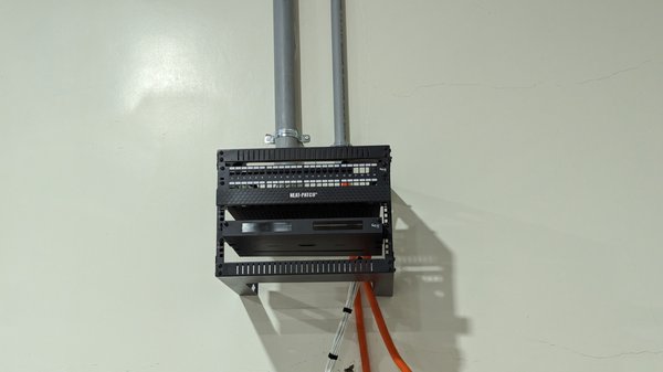 Office Expansion 2023 - This aerospace company added more space for their production floor, we installed a fiber link from the server core to the new area, added 10 cubicles with 2 ports each, and patch them to a 6U wall mount rack, all external cabling was routed through a 2-inch flex conduit leaving space for future growth, the fiber was router through a 1-inch flex.