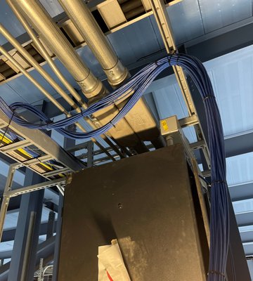 Low voltage data wiring for sports arena - After a successful and clean professional job installing low voltage data lines for a sports arena that accommodates over 11,000 guests, we were called back to install additional CAT 6 Data lines for their new high tech cameras for their sports team TV broadcast.