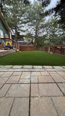 Back yard remodel - Reconstruction to a back yard with one upper section and one lower section. We installed a small staircase with rails to connect both sections, rebuilt the lower section with pea gravel and playground mulch, and a nice pet friendly artificial turf on the upper section. Back yard remodel - Reconstruction to a back yard with one upper section and one lower section. We installed a small staircase with rails to connect both sections, rebuilt the lower section with pea gravel and playground mulch, and a nice pet friendly artificial turf on the upper section.