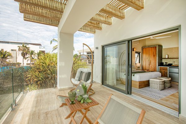 BEACHHOUSE VILLA DESIGN & STAGING - This full-scale remodel, interior design and staging resulted in a total transformation of the former Casa Chillax. Now a luxury beachfront rental property, this villa is set on its own private beach cove with every amenity within arm's reach.  The furnishings are all curated from our Sayulita Collection and feature commercially rated outdoor seating, an enormous custom table under the palapa, 4-fully appointed bedroom en suites set across two- sprawling levels and an ample living space dividing into multiple groupings. This is the perfect destination to accommodate a party of 8 guests or more.
