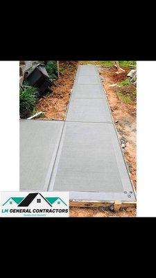 Concrete - Construction of a New residential Driveway. Concrete - Construction of a New residential Driveway.