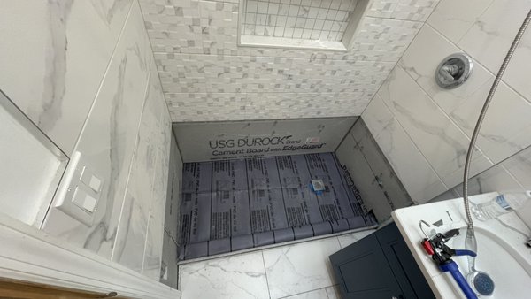 Repairing a shower that was leaking - Customer called was linking bottom floor. Repairing a shower that was leaking - Customer called was linking bottom floor.