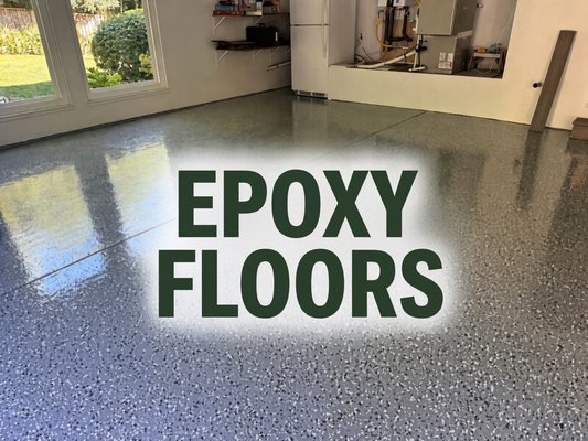Garage floor epoxy coating - removed the old coating and ground the floors for tooth, Then applied an epoxy floor coating base coat for color and texture, Then top coated it with a clear high solids coating.