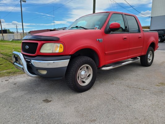 Red F-150 gets a full exterior spray in red color match. - This customer wanted to protect the exterior of his F-150. He's planning to use the truck to get to his hunting camp and it would have to drive down some over grown trails. These trails would have scratched up the sides so he wanted extra protection. LINE-X was the solution but when he saw that we could do a color code match, it was a done deal. This came out fantastic. Red F-150 gets a full exterior spray in red color match. - This customer wanted to protect the exterior of his F-150. He's planning to use the truck to get to his hunting camp and it would have to drive down some over grown trails. These trails would have scratched up the sides so he wanted extra protection. LINE-X was the solution but when he saw that we could do a color code match, it was a done deal. This came out fantastic.